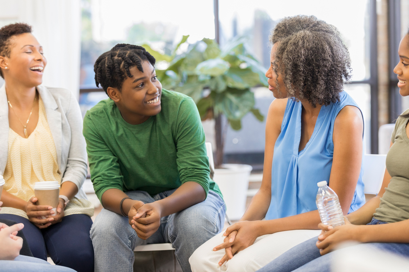 Teenage boy participates in group therapy session